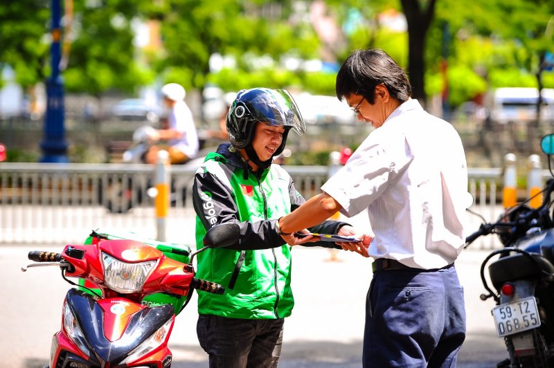 Gojek tung đồng giá chuyến đi 1.000 đồng trong ngày 5/8 cho khung giờ cao điểm. Ảnh: Tri Anh.