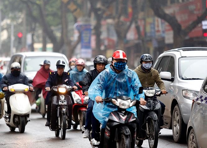Muôn kiểu chống đợt rét tăng cường của người dân thủ đô