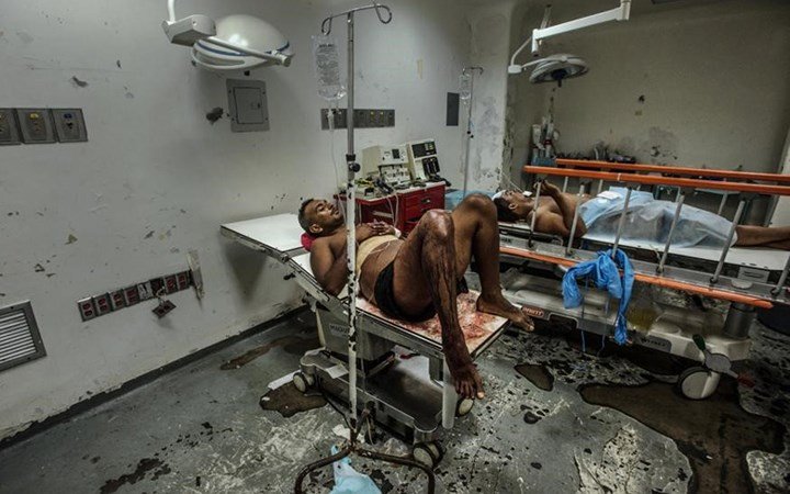 Khủng hoảng ở Venezuela: Không dùng ví mà dùng...bao tải đựng tiền