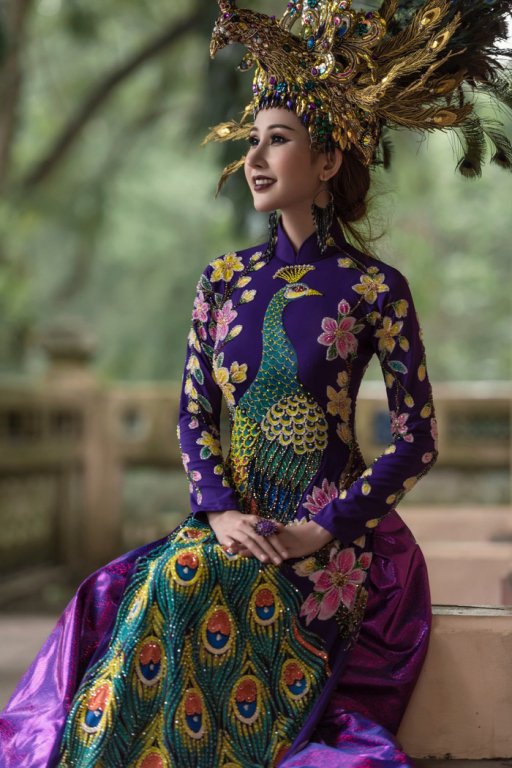 chi-nguyen-mac-ao-dai-chim-khong-tuoc-nang-20kg-tai-hoa-hau-chau-a-the-gioi-2018