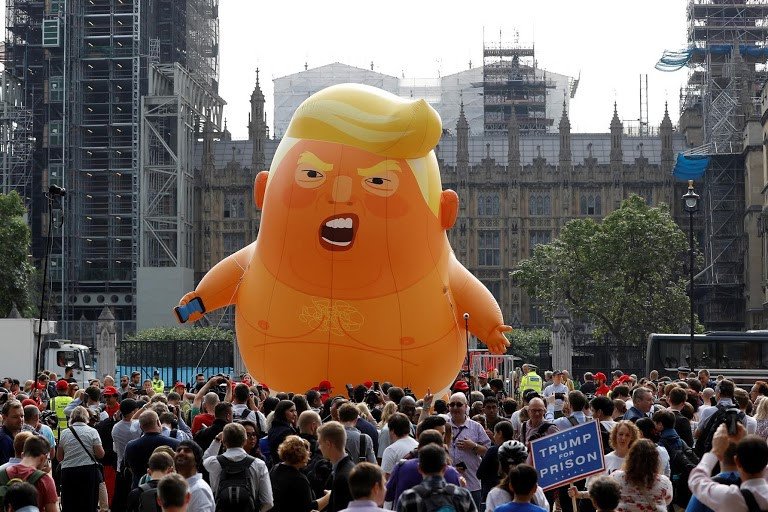 Nam 2018 day kich tinh cua Tong thong Trump qua anh hinh anh 10