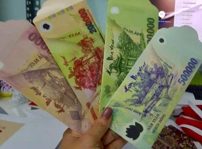 li-xi-in-anh-tien-500000-dong-co-pham-luat