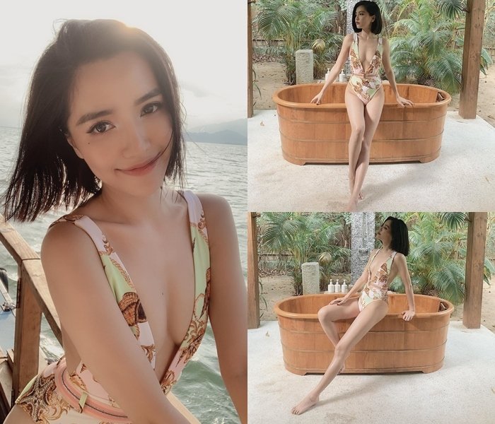 Bích Phương gợi cảm với bikini liền mảnh tôn dáng đôi chân dài. Nữ ca sĩ đang dính tin đồn bí mật hẹn hò với Shark Khoa khi cả hai để lộ background chụp ảnh giống hệt nhau khi đi du lịch.