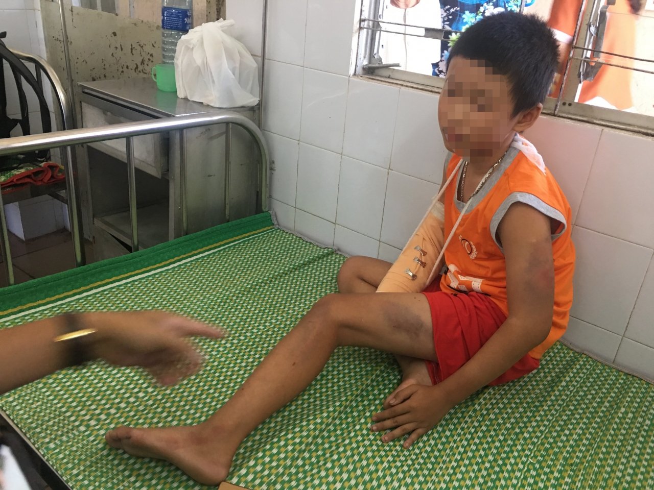 danh-dap-cuop-tien-cua-cau-be-ban-ve-so-khoi-to-vu-an