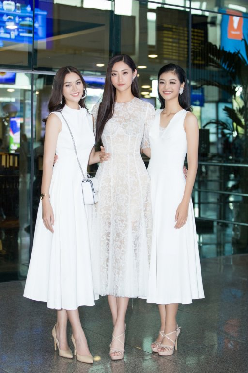 Hoa hau Luong Thuy Linh cung 2 A hau rang ro tai san bay, hanh phuc khi duoc fan chao don hinh anh 5