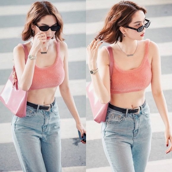 Ngọc Trinh khoe eo thon với áo crop top khi ra sân bay.