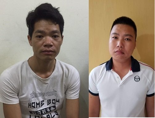 Hai nghi phạm đổ dầu thải ở Hòa Bình Nguyễn Chương Đại (bìa phải) và Hoàng Văn Thám (bìa trái).