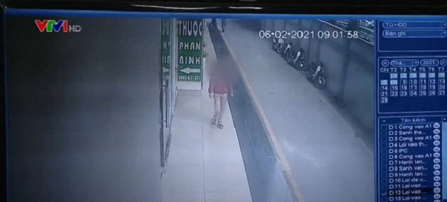 Hình ảnh nữ bệnh nhân 2009 trích xuất từ camera an ninh tại chung cư. (Ảnh: VTV).